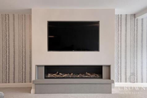 Feature Fireplace to Lounge