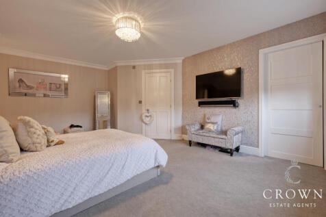 Bedroom Three with en-suite and fitted wardrobe   