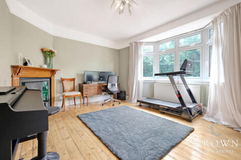 Formal Lounge/Dining Room with Bay Window To The F