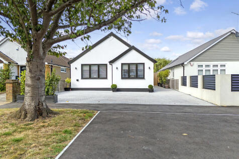 Front View driveway with parking for several vehic