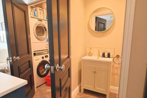 Utility Cupboard and Downstairs WC