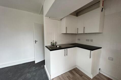 Open plan living room/kitchen