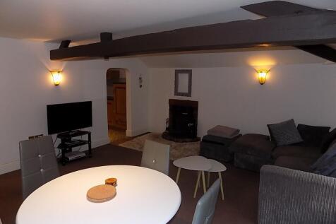 BEAMED SITTING ROOM/