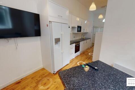 Bar Table TV and Kitchen