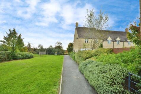 Open green to side of property 