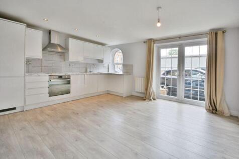 Open plan reception and kitchen