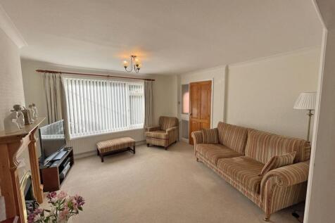 Dunraven Drive 66- Living Room.jpg