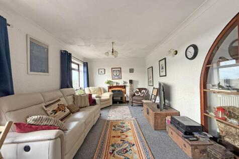 Combley Drive 9 - Living Room Front.jpg