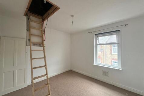 bedroom with loft ladder.jpg