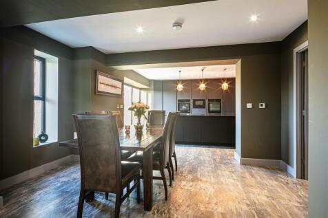 Dining area through to kitchen