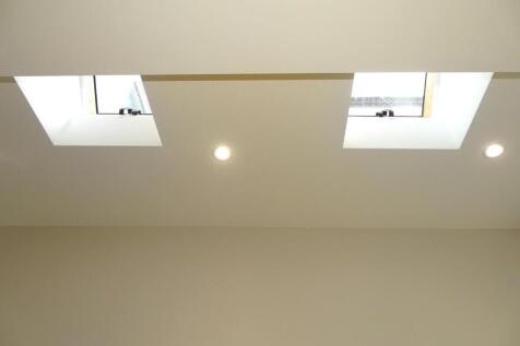 SKY LIGHTS TO VAULTED CEILING