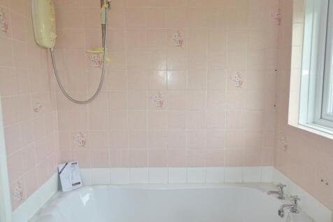 FITTED WITH ELECTRIC SHOWER