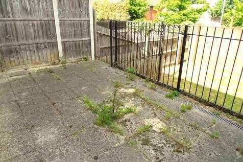 RAISED PAVED PATIO AREA