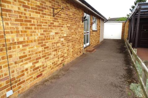 LONG DRIVEWAY AND DETACHED GARAGE