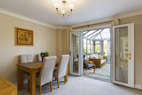 Dining room through to conservatory