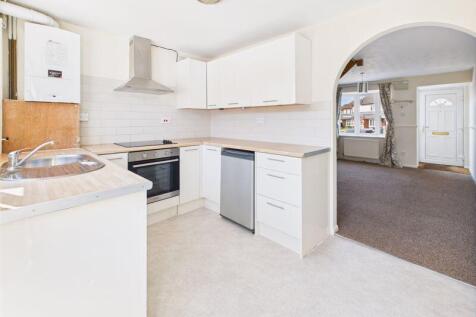 Kitchen through to Living Room