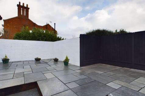 Rear paved courtyard