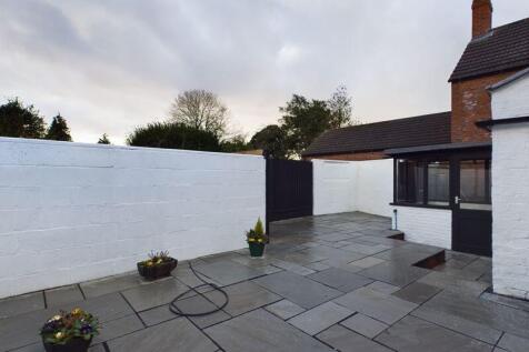 Rear paved courtyard