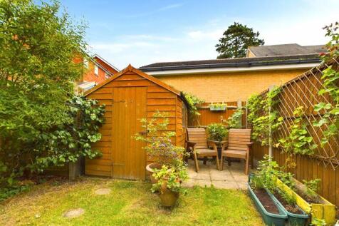REAR OF GARDEN- SHED &amp; SEATING AREA