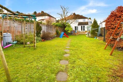 REAR ASPECT FROM THE END OF THE GARDEN