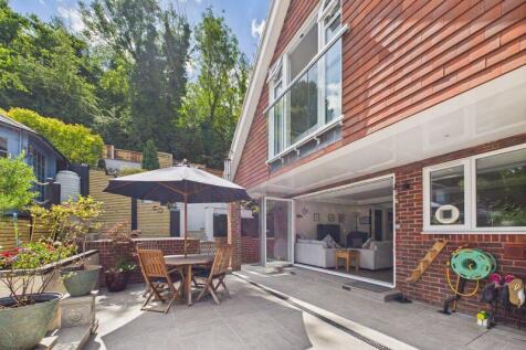 REAR PATIO WITH ALL YEAR ROUND COVERE...