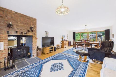 LIVING ROOM WITH STOVE FIREPLACE