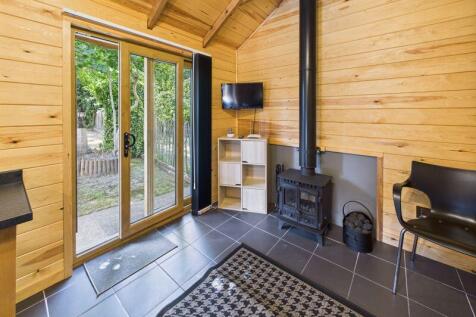 SEATING AREA IN CABIN WITH MULTI-FUEL...