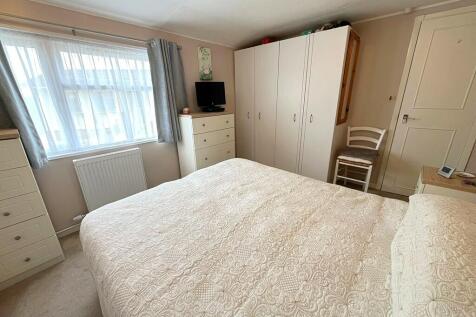 Bed 1 to wardrobe