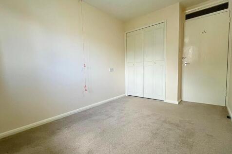 Bed 1 to wardrobe