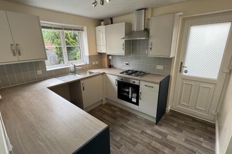 Kitchen from dine...