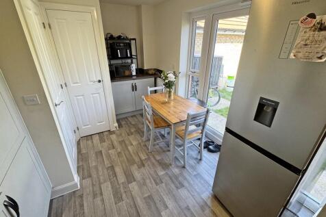 Kitchen to dining...