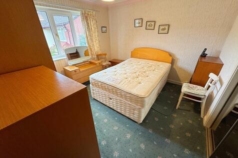Bedroom One alt a...