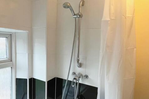Shower over bath