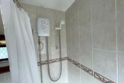 Shower over bath