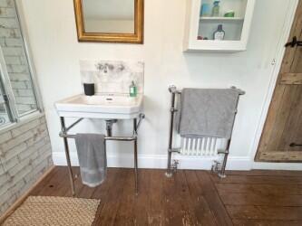 Basin and towel rail