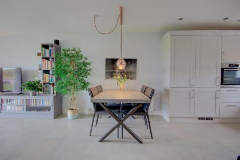 OPEN PLAN SITTING ROOM/KITCHEN
