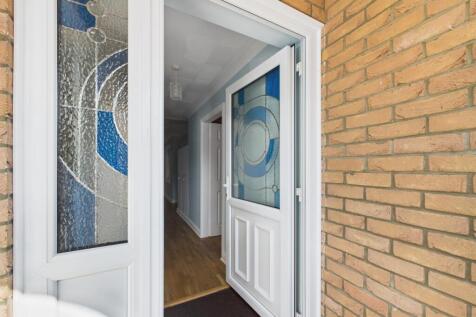 Covered front porch with door to: