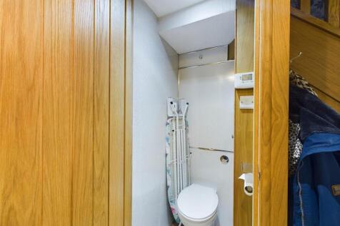 Under Stairs Cupboard and WC