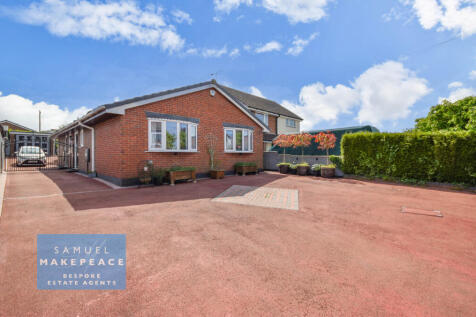 LARGE DETACHED TWO BEDROOM BUNGALOW with DETACHED