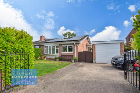 Two Bedroom Bungalow with Detached Garage and Fre