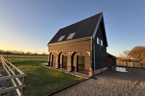 Granary exterior with fence.jpg