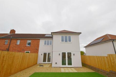 Rear view of property and patio.jpg