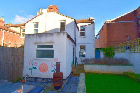 Rear view of property and patio.jpg