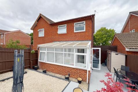 Rear view of property and patio.jpg