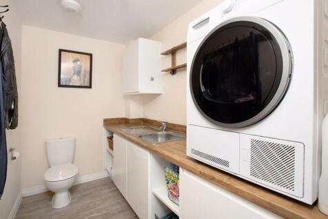 UTILITY ROOM AND  W/C