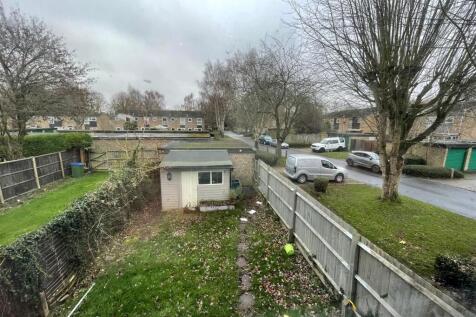 Garden with garage and driveway.jpeg