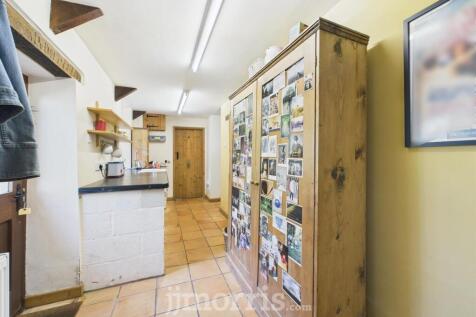 Hardwood Entrance Door to:-
