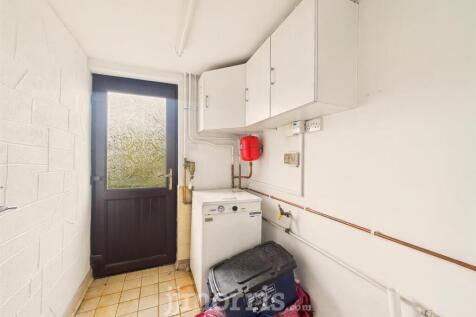 FRONT HALLWAY / UTILITY AREA