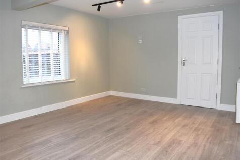 LOUNGE OPEN TO KITCHEN