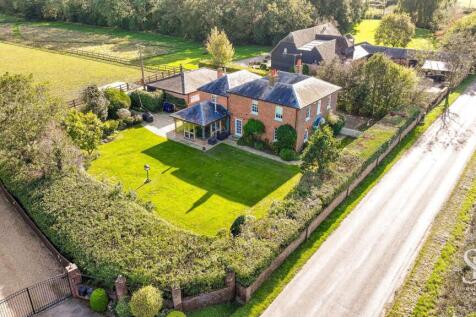Aerial View of House with Gated Entrance